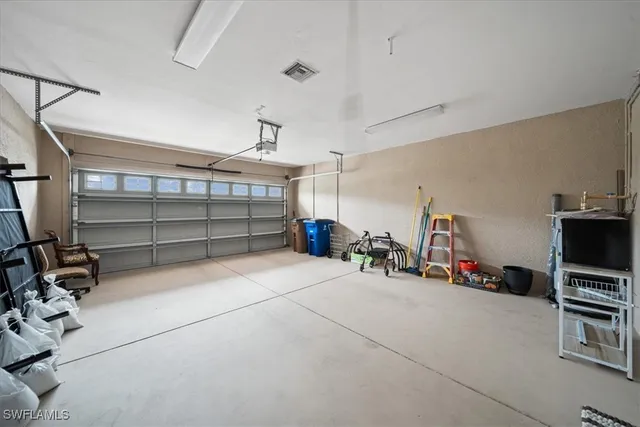 a view of a garage with rack and bicycle
