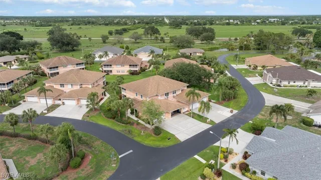 an aerial view of a city with lots of residential buildings