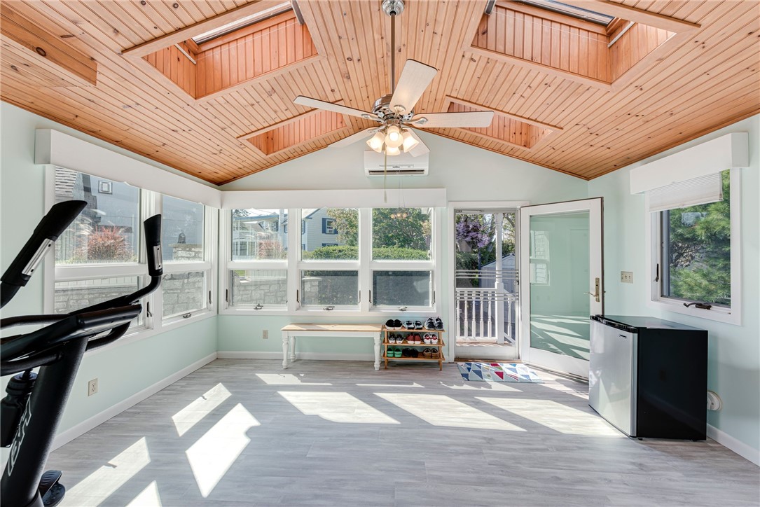 145 Colonel John Gardner Road Narragansett, RI 02882 - Photo 9 of 47 Sunroom with fireplace