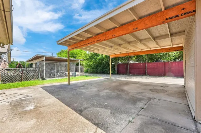 a view of backyard with a swimming pool