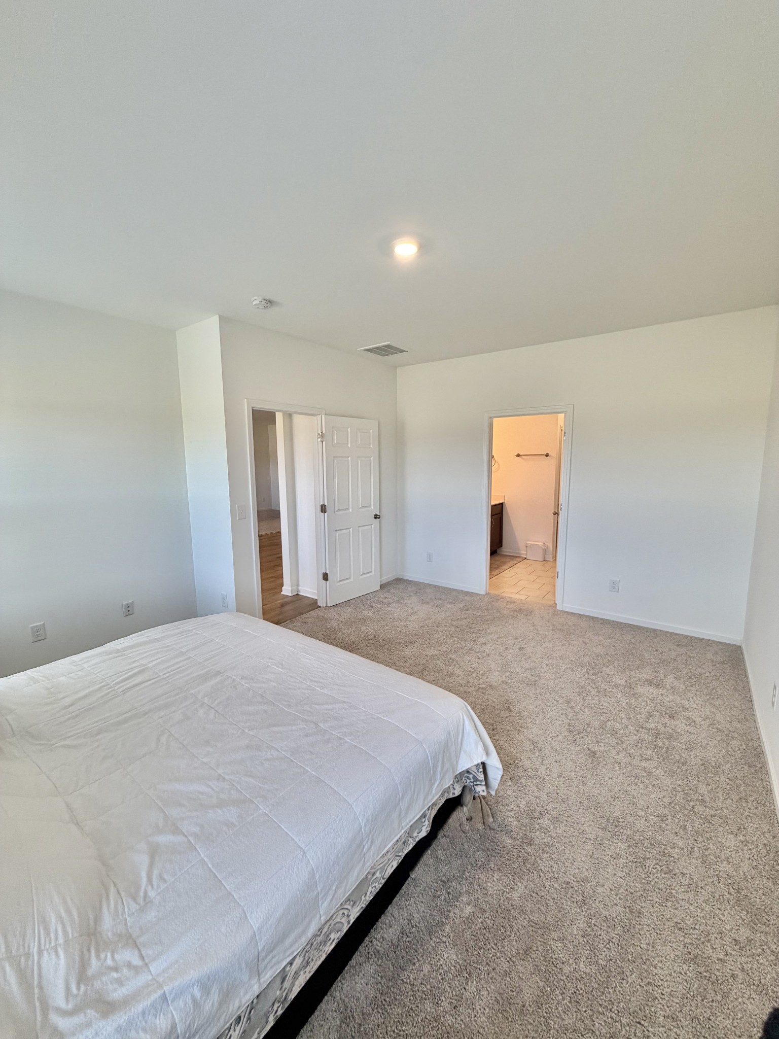 4918 Turquoise Lane Murfreesboro, TN 37129 - Photo 12 of 18 a bedroom with a bed and cabinets