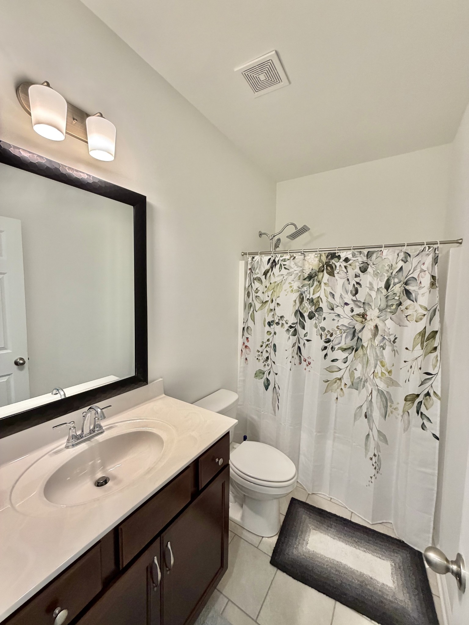 4918 Turquoise Lane Murfreesboro, TN 37129 - Photo 15 of 18 a bathroom with a sink toilet and shower