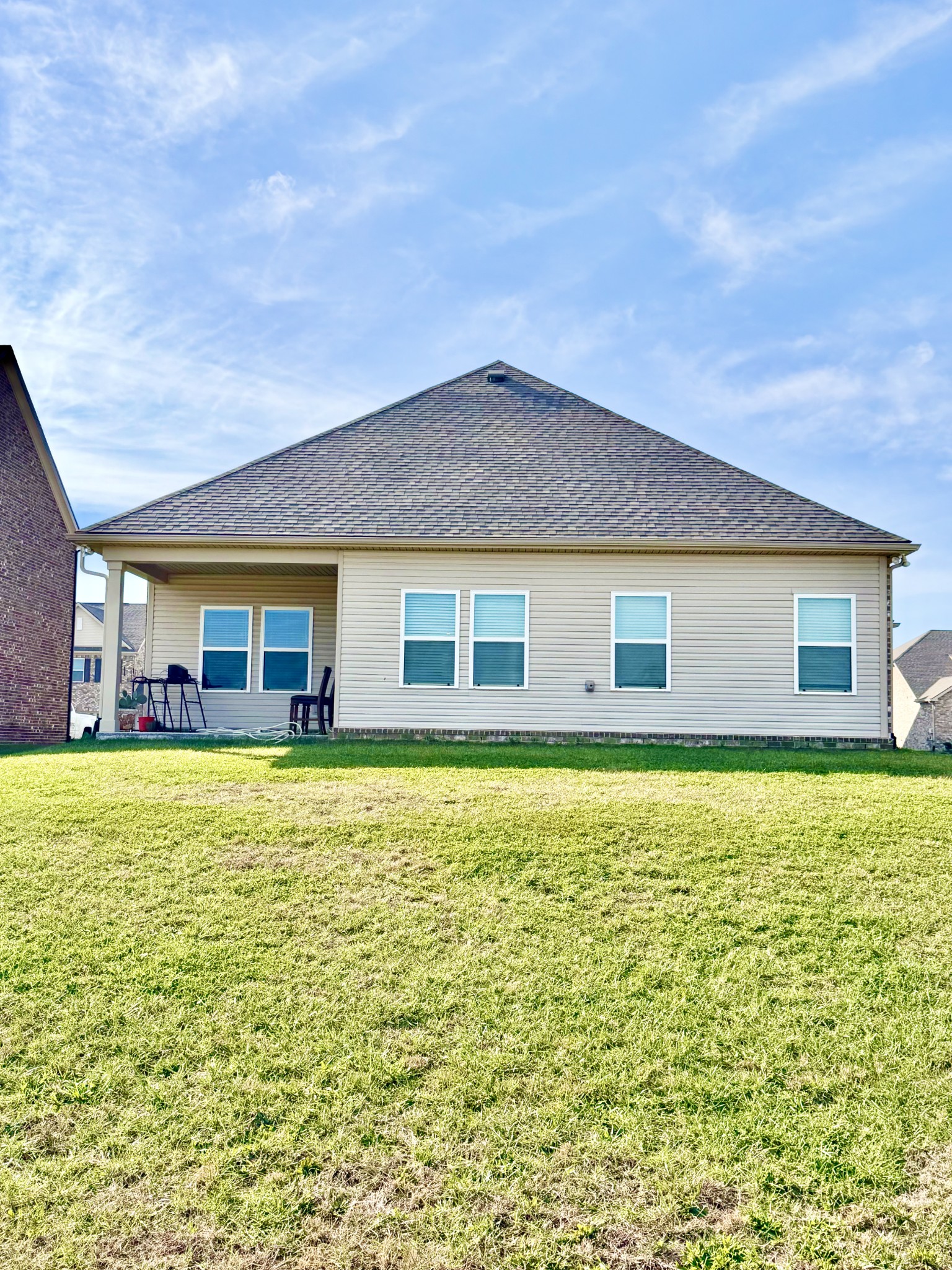 4918 Turquoise Lane Murfreesboro, TN 37129 - Photo 16 of 18 a view of a house with pool and a yard