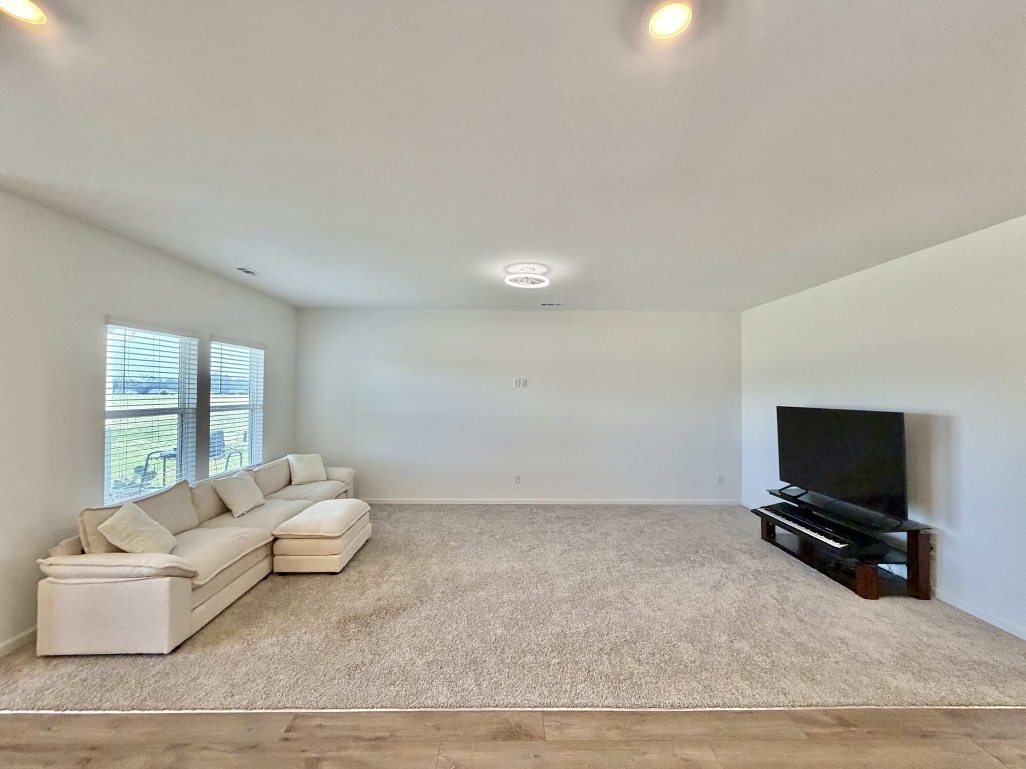 4918 Turquoise Lane Murfreesboro, TN 37129 - Photo 6 of 18 a living room with furniture and a flat screen tv