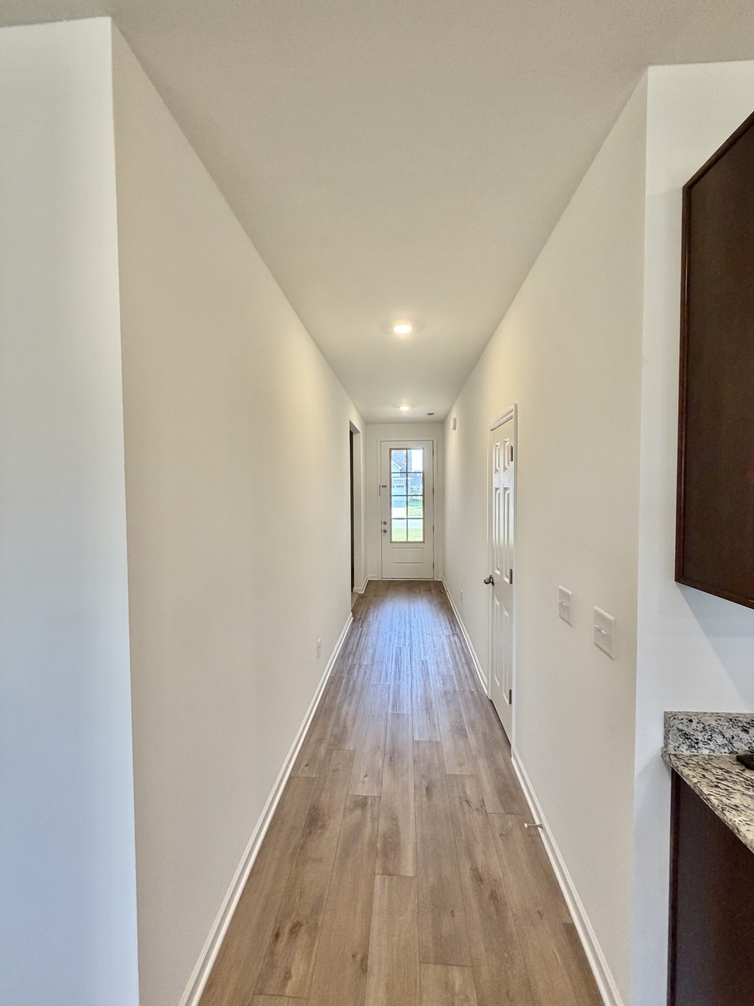 4918 Turquoise Lane Murfreesboro, TN 37129 - Photo 7 of 18 a view of hallway with wooden floor