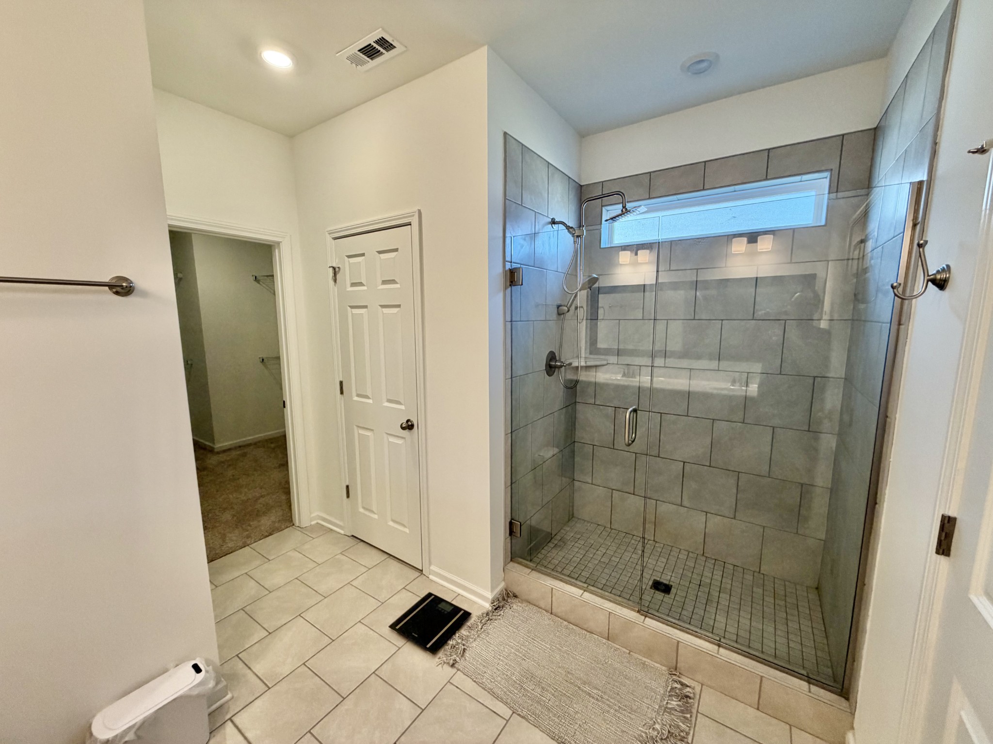 4918 Turquoise Lane Murfreesboro, TN 37129 - Photo 8 of 18 a bathroom with a shower and a sink