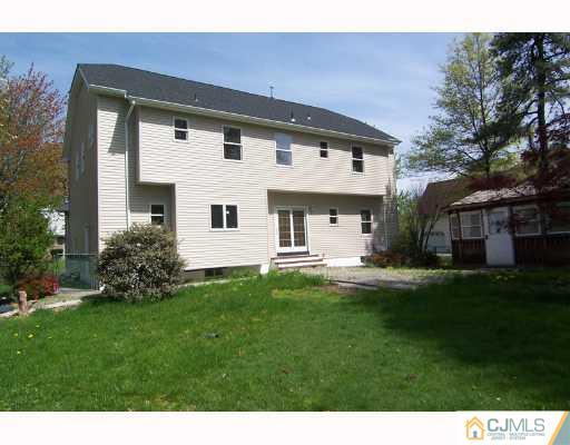 1117 New Dover Road Edison, NJ 08820 - Photo 7 of 8 a view of a house with a backyard
