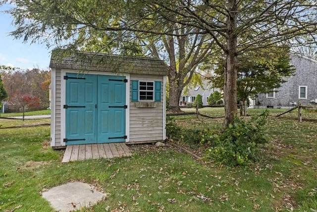 a view of a backyard of the house