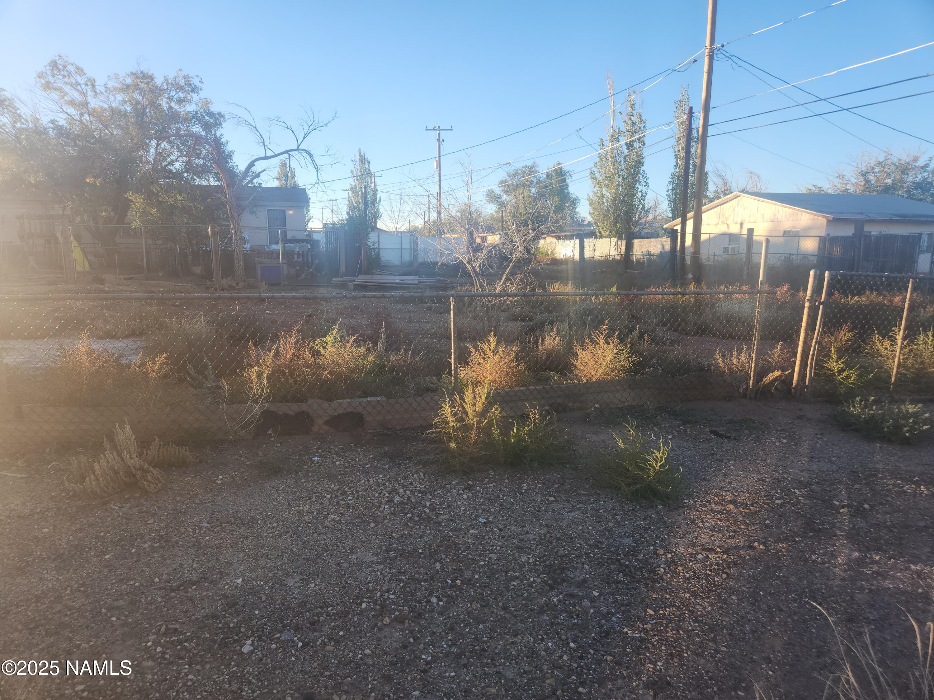 415 South Edwin Avenue Winslow, AZ 86047 - Photo 2 of 9 a view of a yard