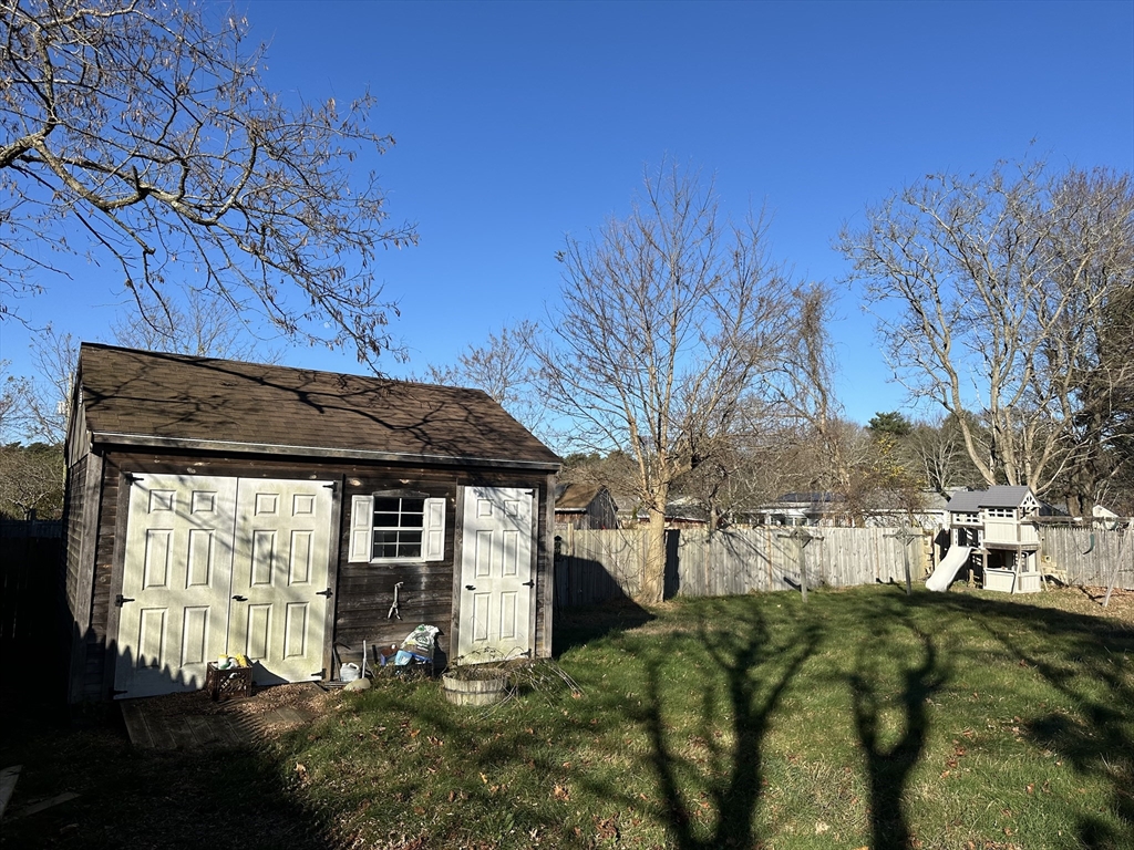 14 Dennis Lane Wareham, MA 02571 - Photo 31 of 33 a front view of a house with a yard