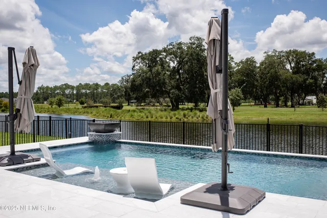 a view of a lake with a fountain