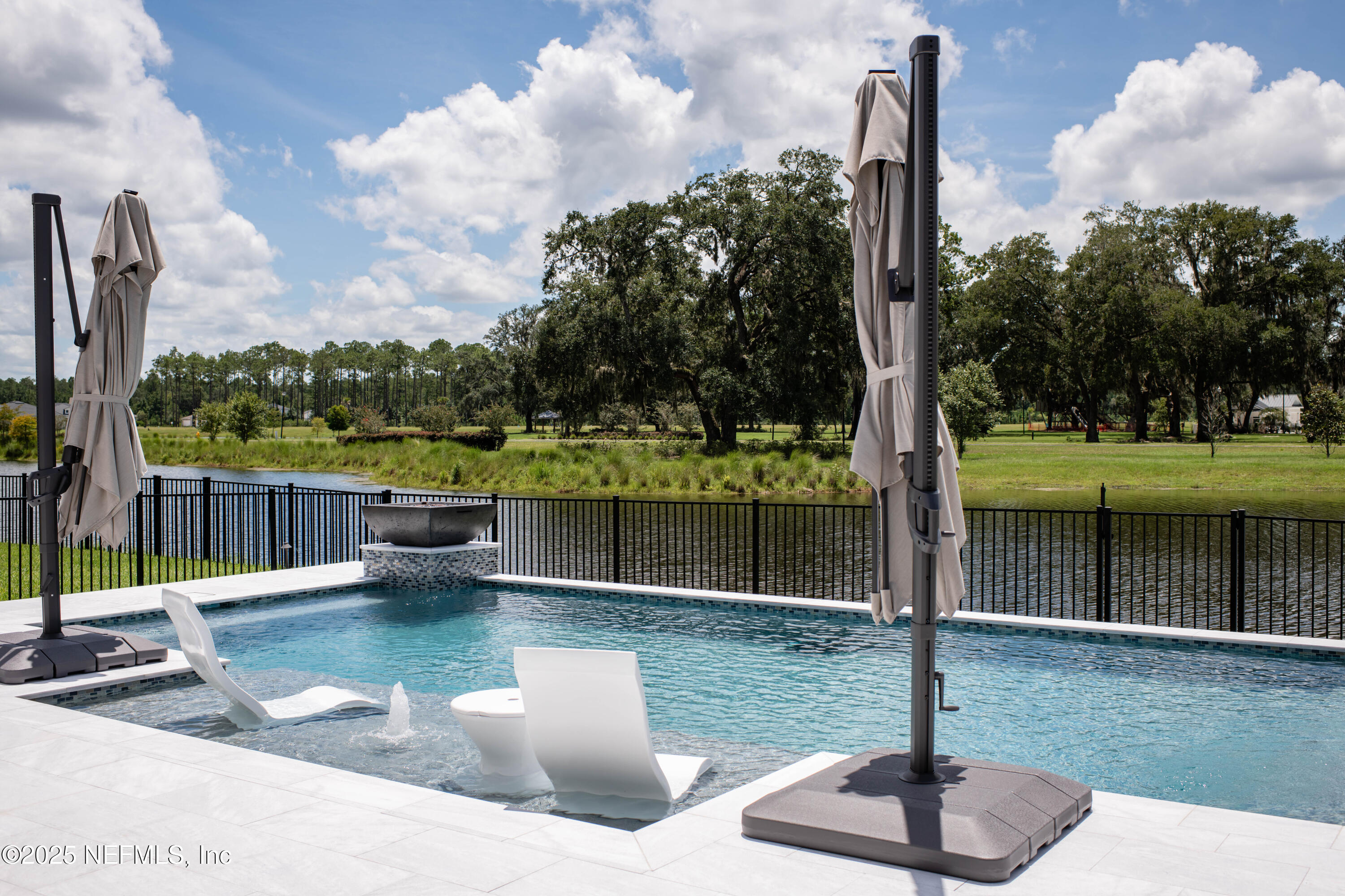 a view of a lake with a fountain