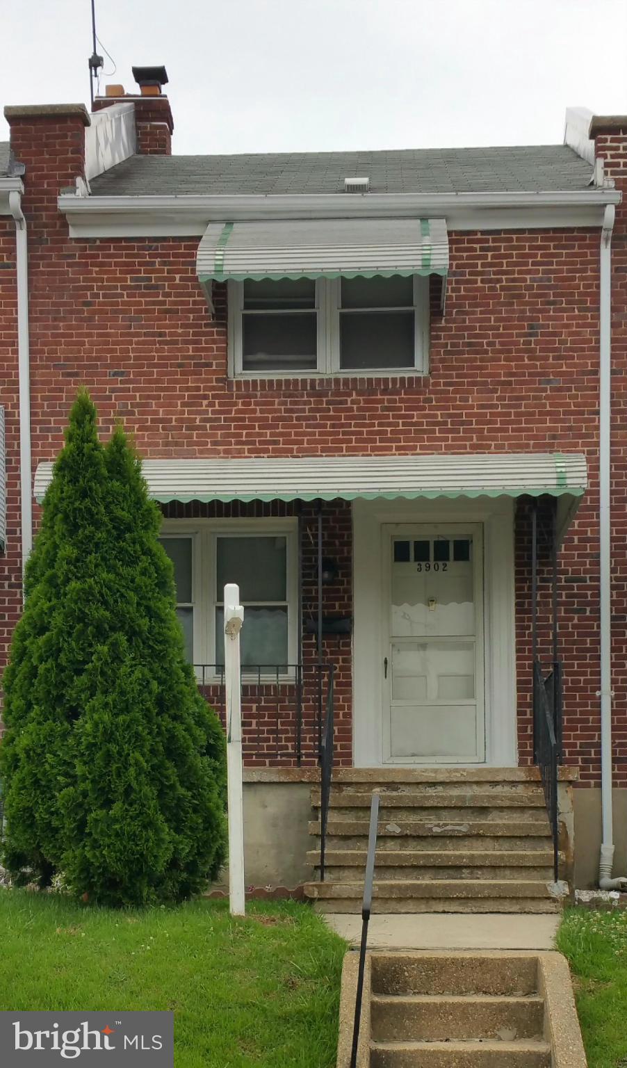 3902 Colchester Road Baltimore, MD 21229 - Photo 1 of 27 a front view of a house