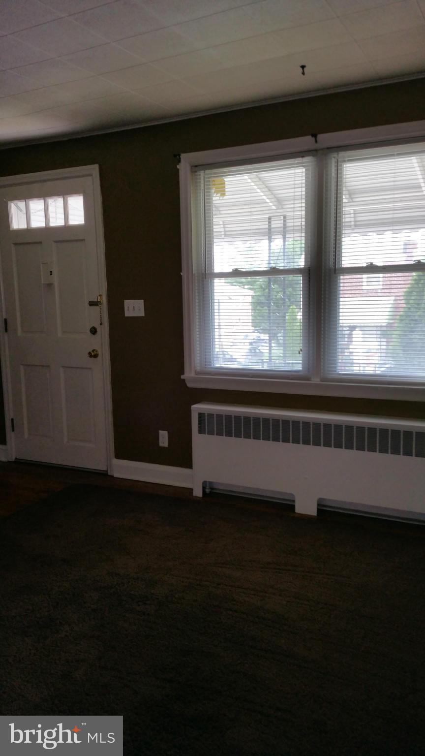 3902 Colchester Road Baltimore, MD 21229 - Photo 24 of 27 a view of an empty room with a window