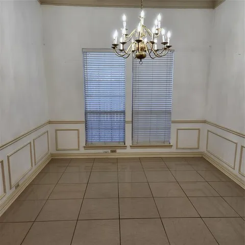 a view of a livingroom with a bathroom