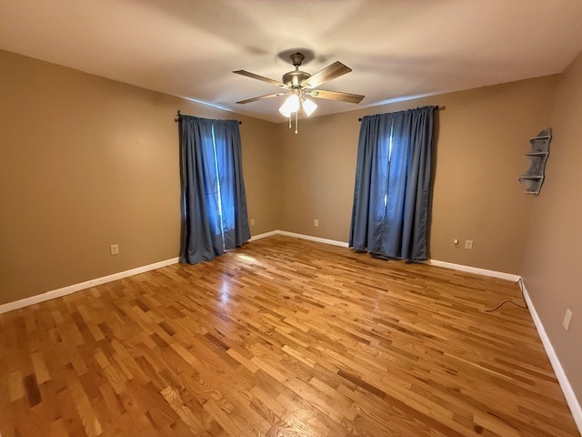 302 West Ward Street Energy, IL 62933 - Photo 11 of 37 a bedroom with a bed and a chandelier