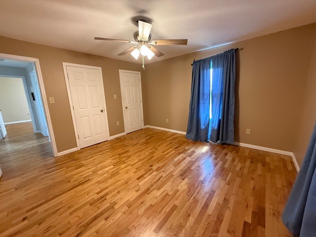 302 West Ward Street Energy, IL 62933 - Photo 12 of 37 a view of an empty room with wooden floor