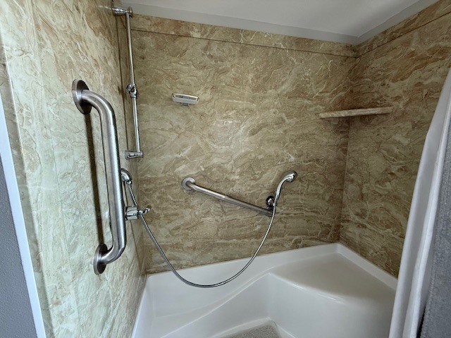 302 West Ward Street Energy, IL 62933 - Photo 18 of 37 a bathroom with a shower and a bath tub