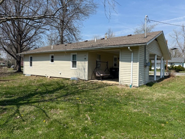 302 West Ward Street Energy, IL 62933 - Photo 26 of 37 a view of a house with a yard