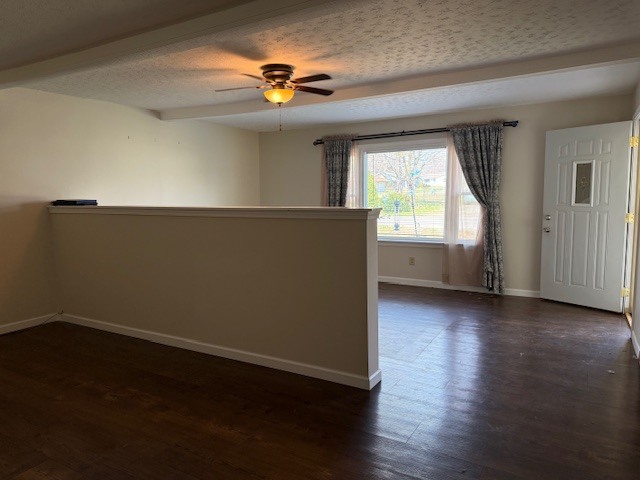 302 West Ward Street Energy, IL 62933 - Photo 4 of 37 an empty room with wooden floor and windows