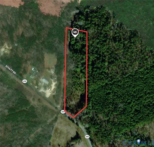 a street sign that is sitting on a green field