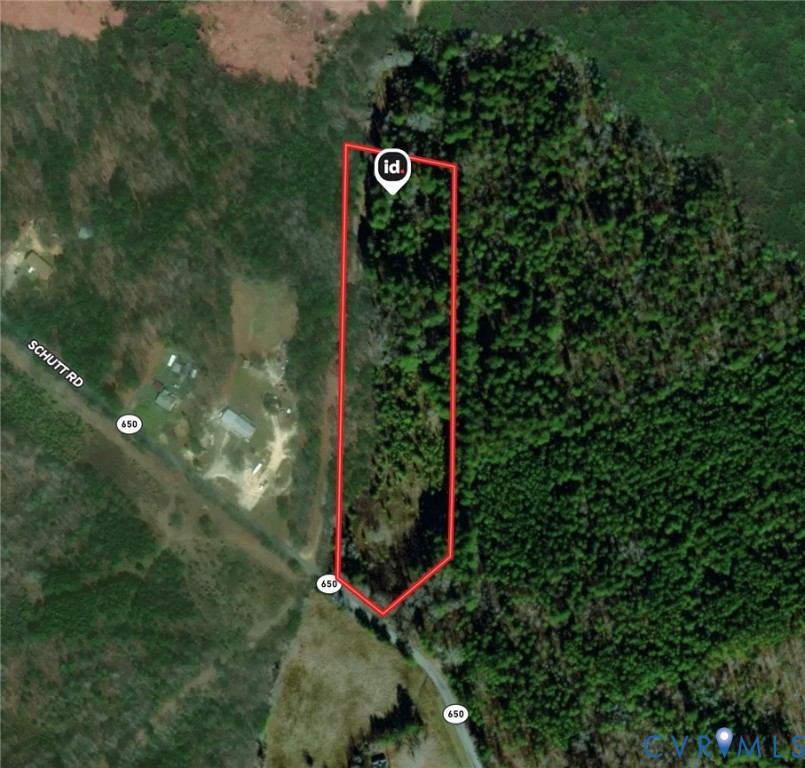 a street sign that is sitting on a green field