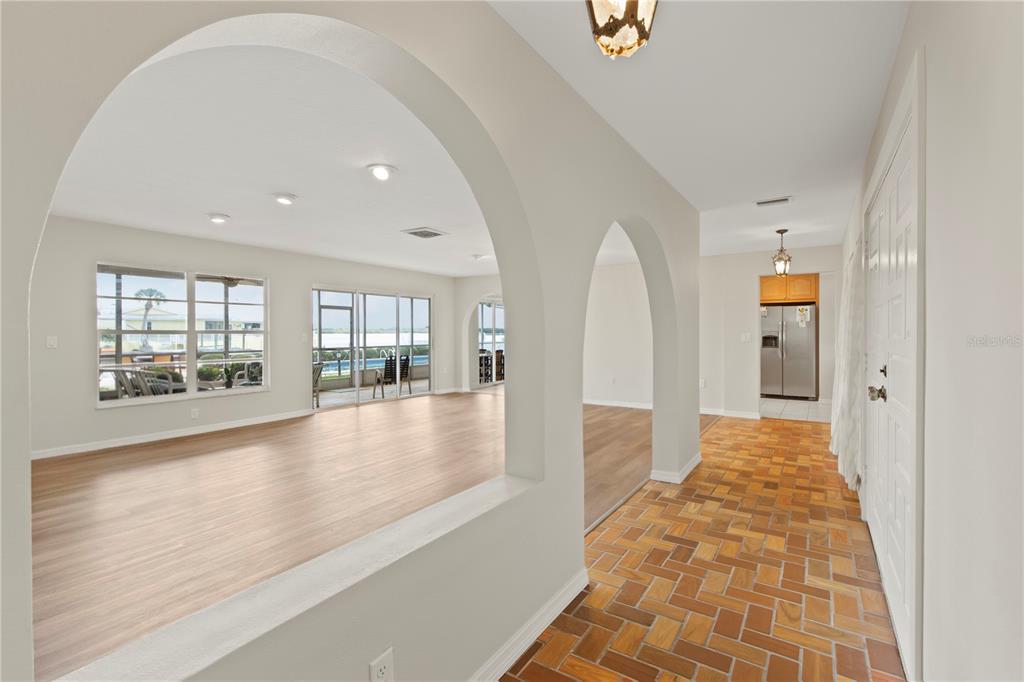 4964 South Shore Drive New Port Richey, FL 34652 - Photo 23 of 69 a view of a hallway with wooden floor and windows