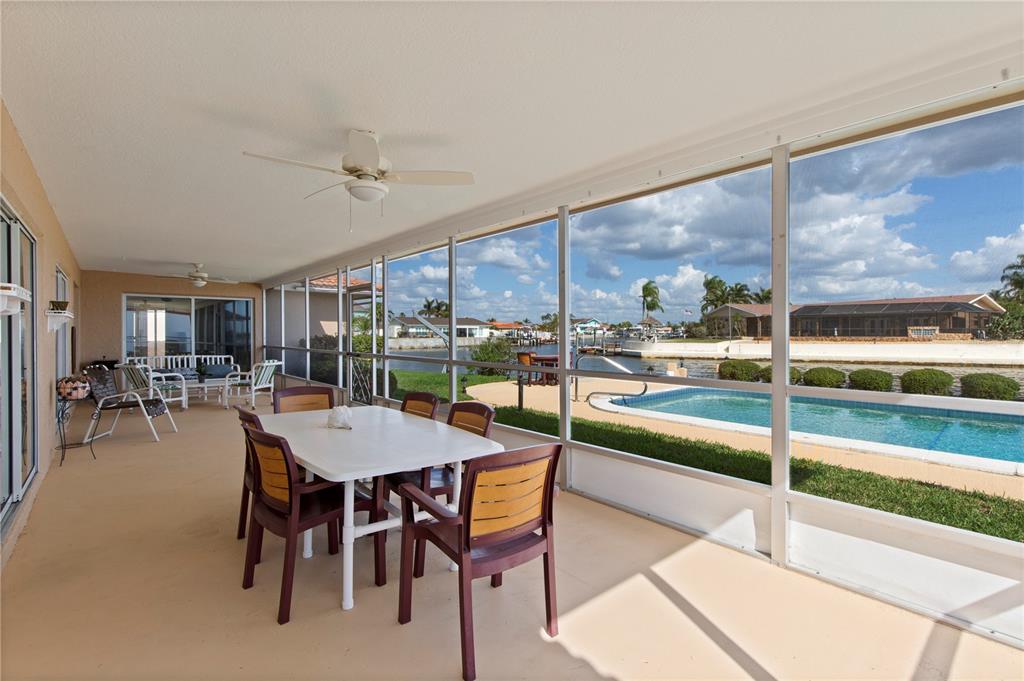 4964 South Shore Drive New Port Richey, FL 34652 - Photo 40 of 69 a view of a dining room with furniture window and outside view
