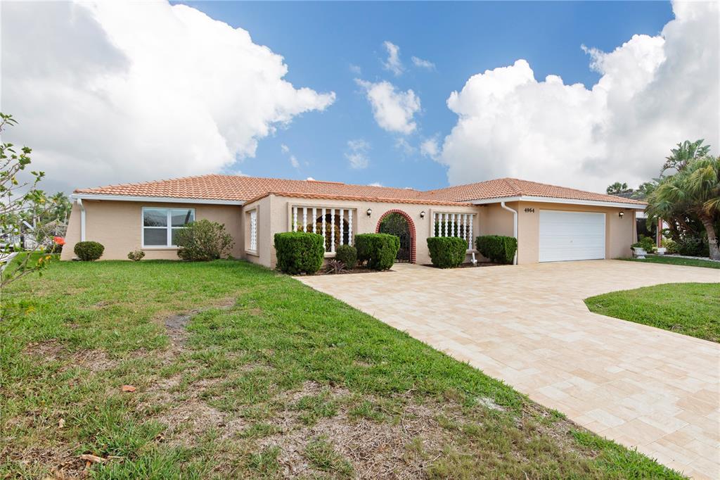 4964 South Shore Drive New Port Richey, FL 34652 - Photo 4 of 69 a view of house with outdoor space and street view