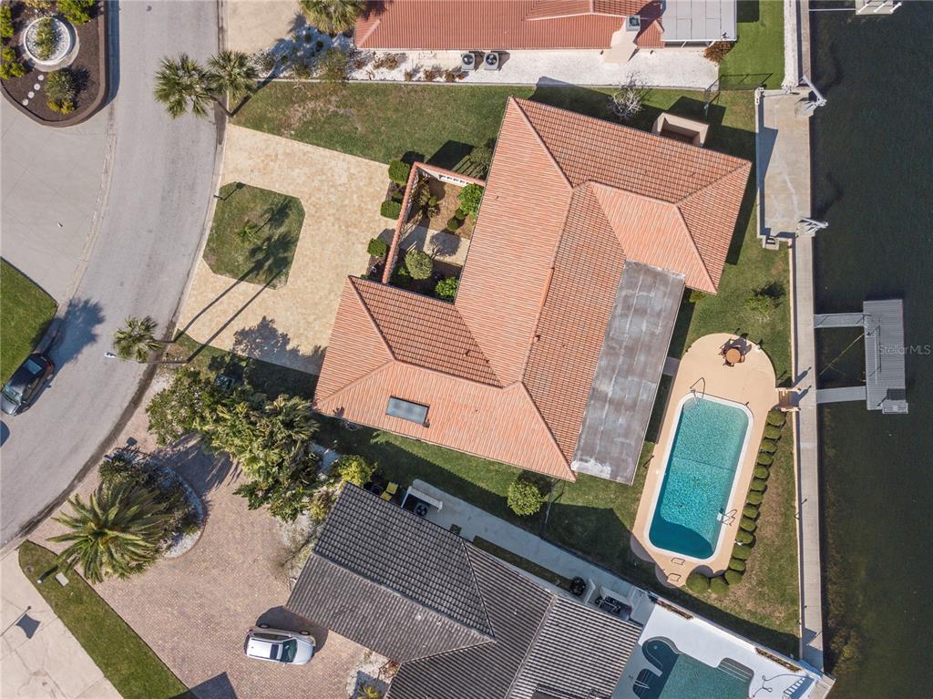 4964 South Shore Drive New Port Richey, FL 34652 - Photo 54 of 69 an aerial view of a house with a swimming pool