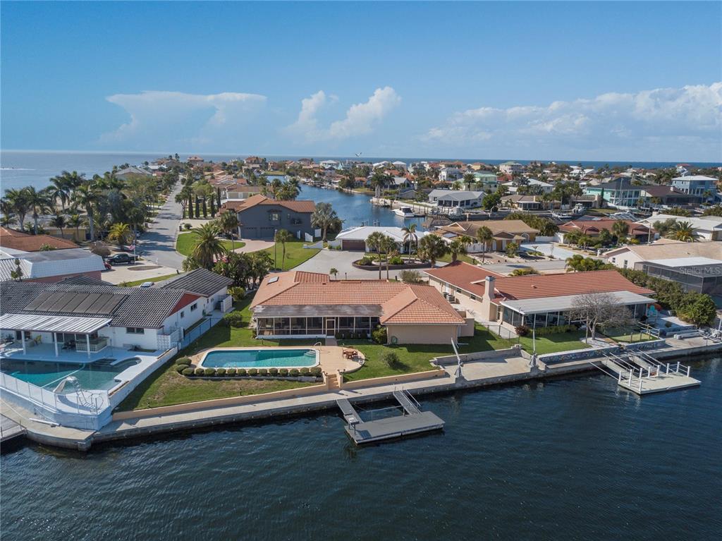 4964 South Shore Drive New Port Richey, FL 34652 - Photo 60 of 69 an aerial view of residential houses with outdoor space