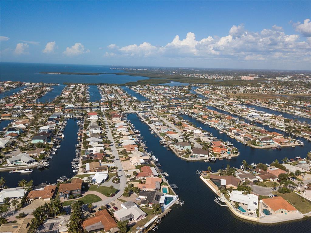 4964 South Shore Drive New Port Richey, FL 34652 - Photo 64 of 69 an aerial view of a residential houses with yard