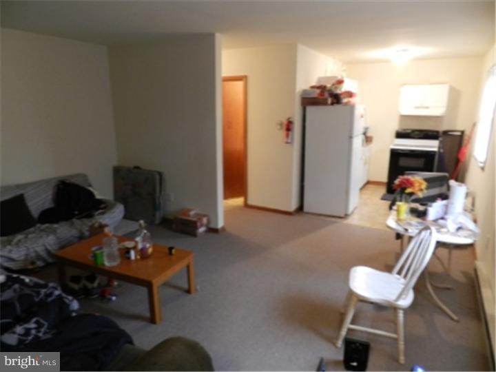 14 Girard Road South Glassboro, NJ 08028 - Photo 11 of 25 a living room with furniture and a wooden floor