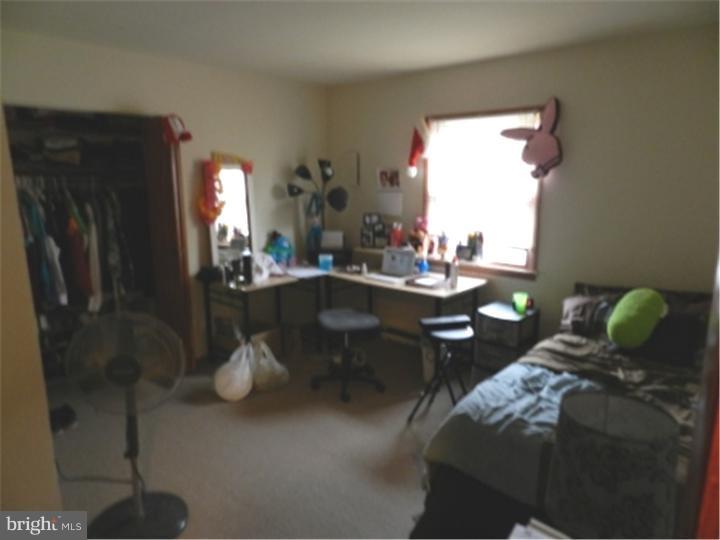 14 Girard Road South Glassboro, NJ 08028 - Photo 15 of 25 a living room with furniture and a window