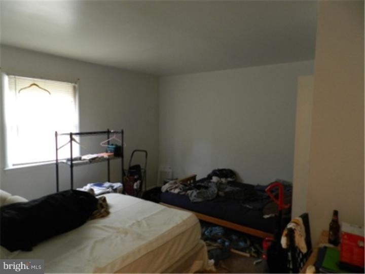 14 Girard Road South Glassboro, NJ 08028 - Photo 20 of 25 a bedroom with a bed window and dresser
