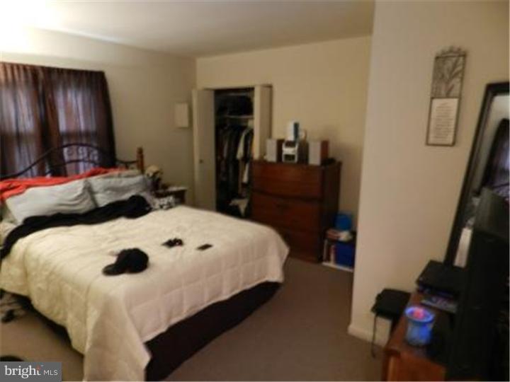 14 Girard Road South Glassboro, NJ 08028 - Photo 24 of 25 a bedroom with a bed and a dresser