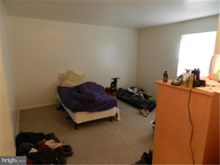 14 Girard Road South Glassboro, NJ 08028 - Photo 5 of 25 a living room with furniture rug and a window