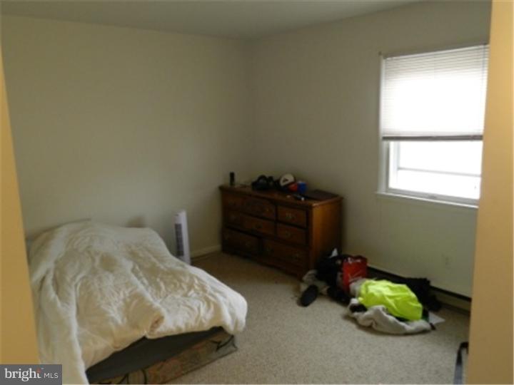 14 Girard Road South Glassboro, NJ 08028 - Photo 9 of 25 a bedroom with a bed and a window
