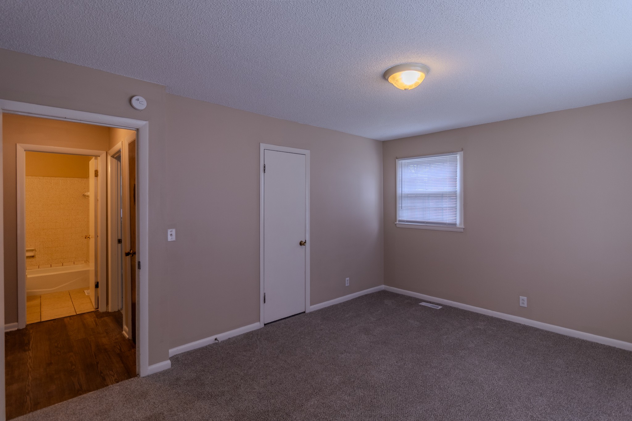 814 Riviera Drive Murfreesboro, TN 37130 - Photo 5 of 8 a view of an empty room with closet and a window