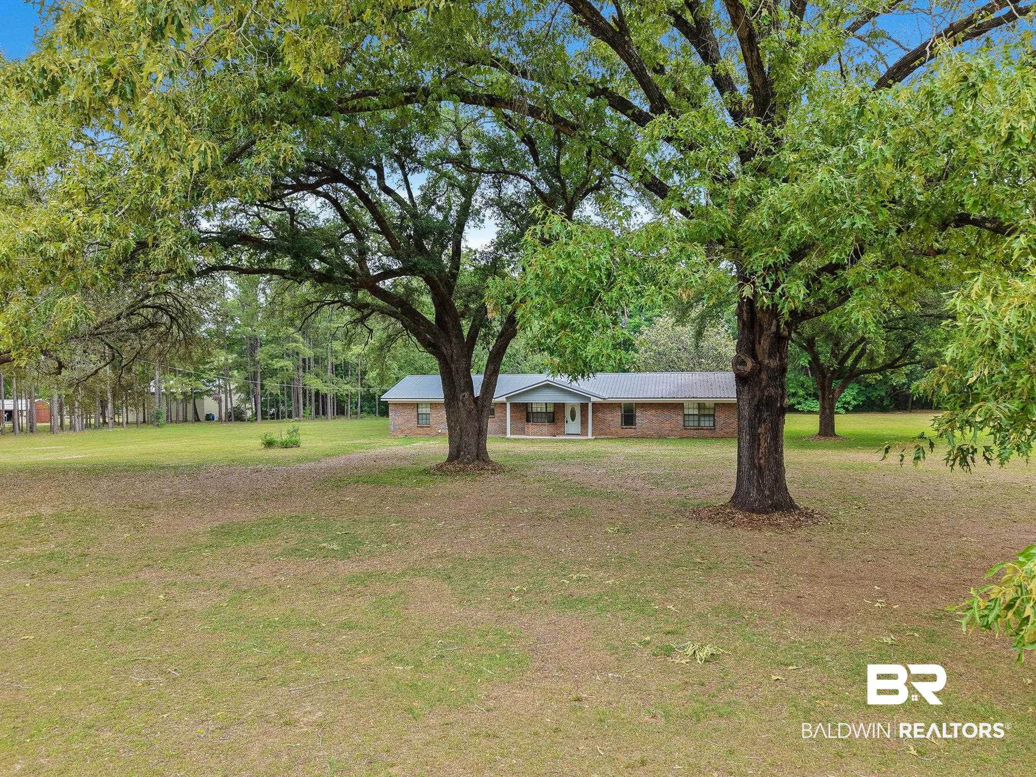 13653 Roberts Road Loxley, AL 36551 - Photo 2 of 33 Spacious property featuring expansive lawns and mature trees