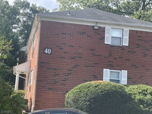 a brick building with a outdoor space