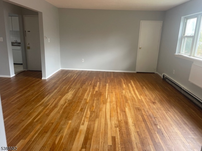 2467 Highway 10 Morris Plains, NJ 07950 - Photo 8 of 11 a view of an empty room and wooden floor