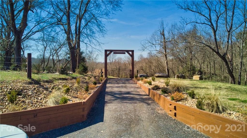 0 Graham Road Mount Ulla, NC 28125 - Photo 2 of 12 a view of a yard with wooden fence