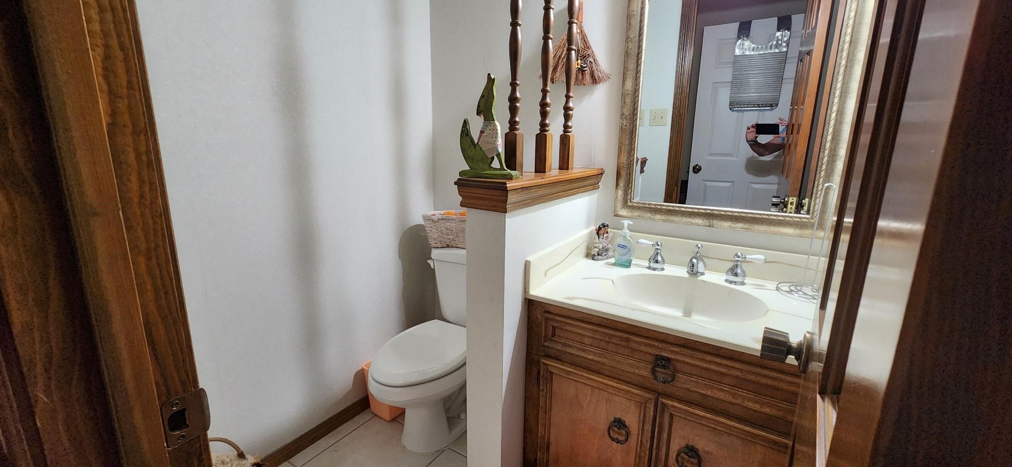 16155 Hexham Drive Spring, TX 77379 - Photo 42 of 47 a bathroom with a sink a toilet and a mirror
