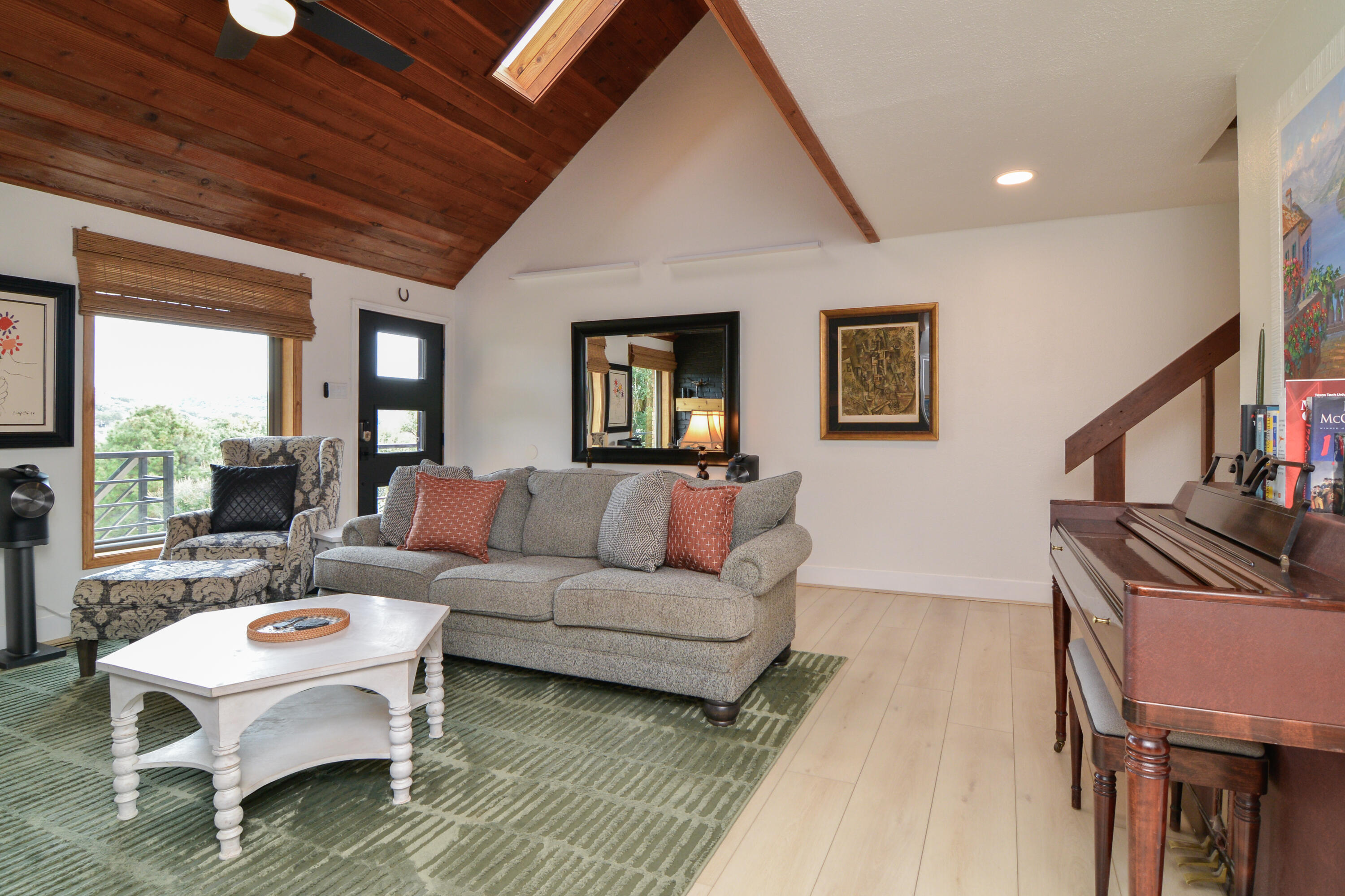 69 South Lake Shore Drive Ransom Canyon, TX 79366 - Photo 12 of 49 a living room with furniture and a flat screen tv