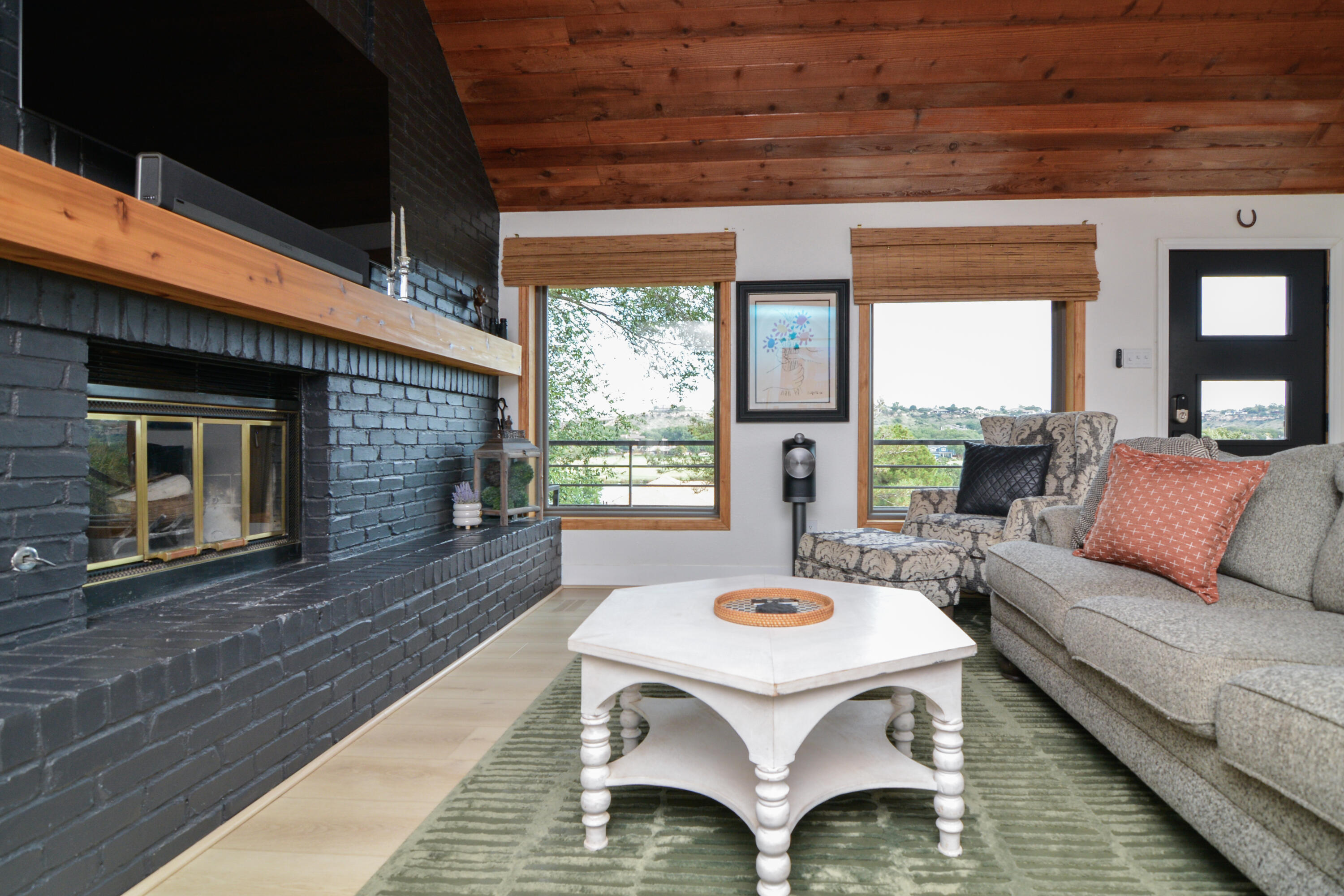 69 South Lake Shore Drive Ransom Canyon, TX 79366 - Photo 13 of 49 a living room with a couch and a table