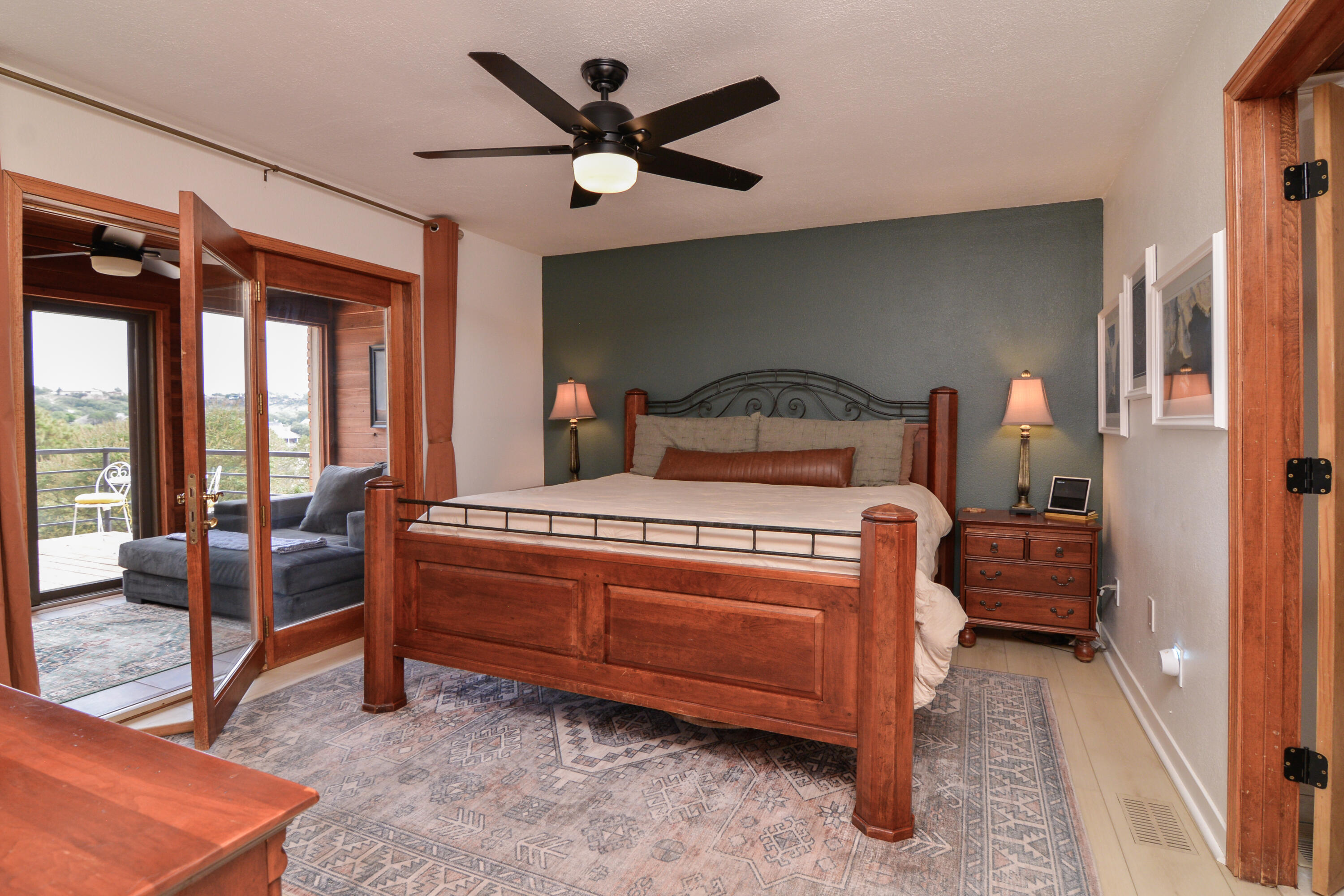 69 South Lake Shore Drive Ransom Canyon, TX 79366 - Photo 22 of 49 a bed room with a bed and a large window
