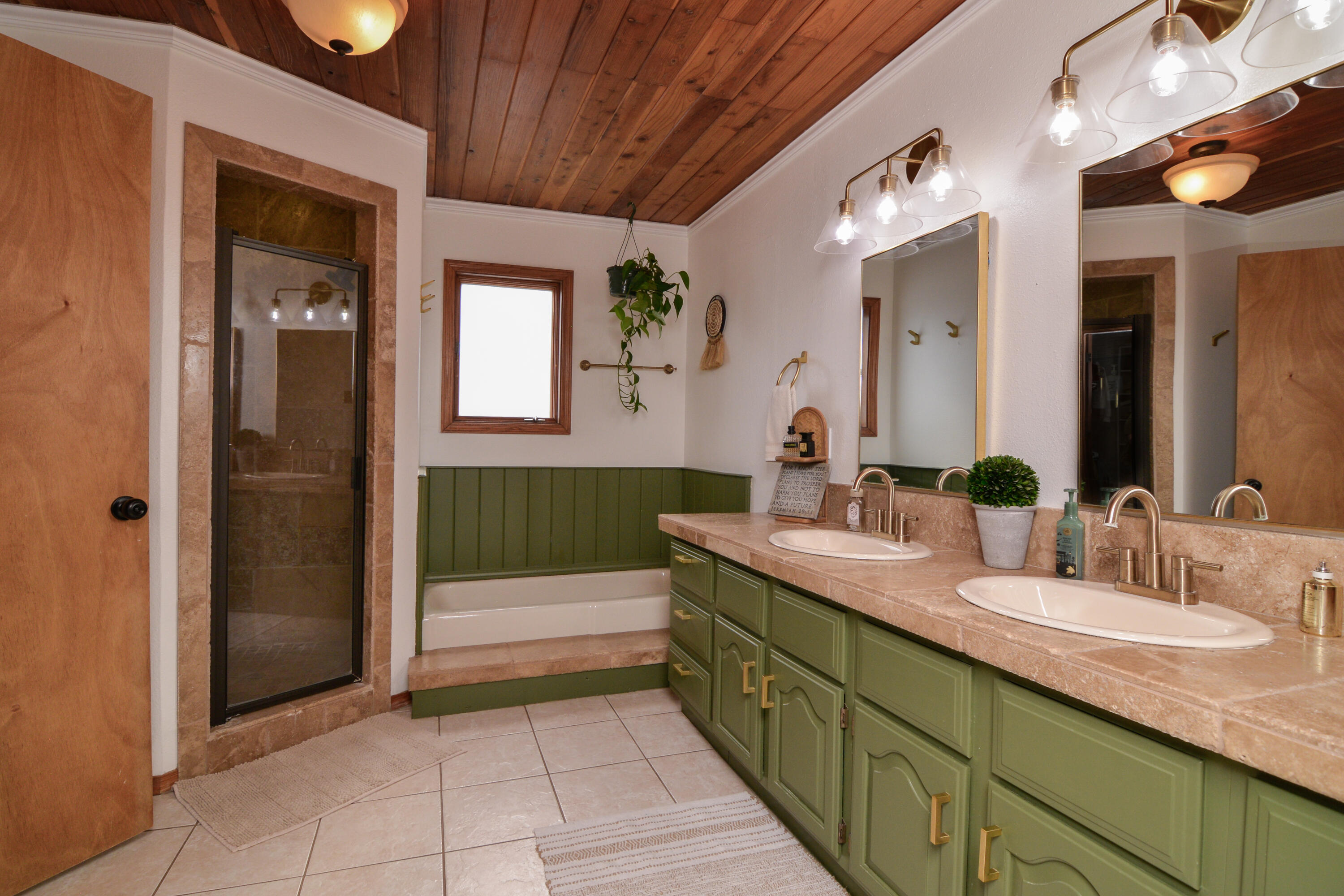 69 South Lake Shore Drive Ransom Canyon, TX 79366 - Photo 24 of 49 a bathroom with a double vanity sink and a mirror