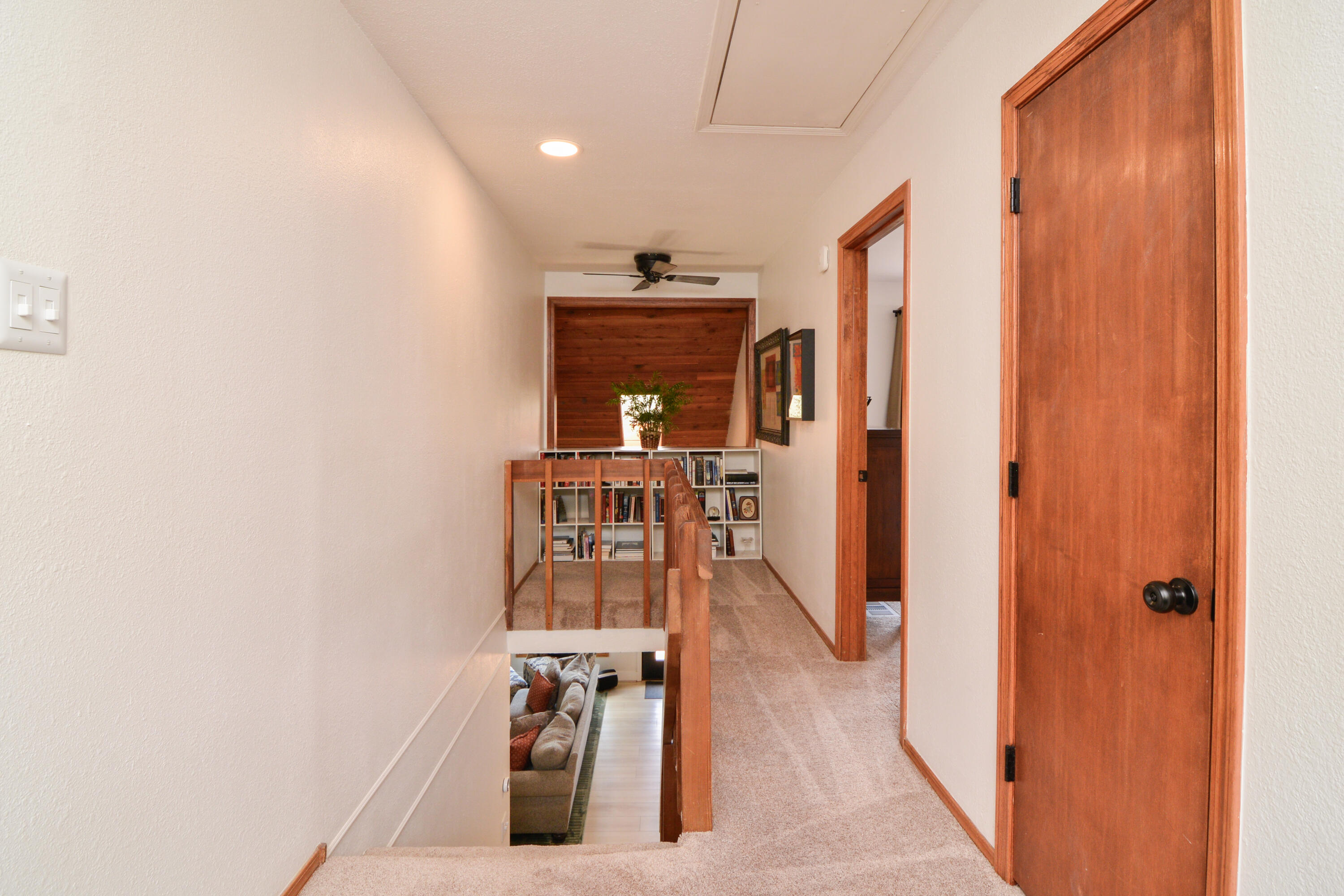 69 South Lake Shore Drive Ransom Canyon, TX 79366 - Photo 34 of 49 a view of a hallway with wooden floor and staircase
