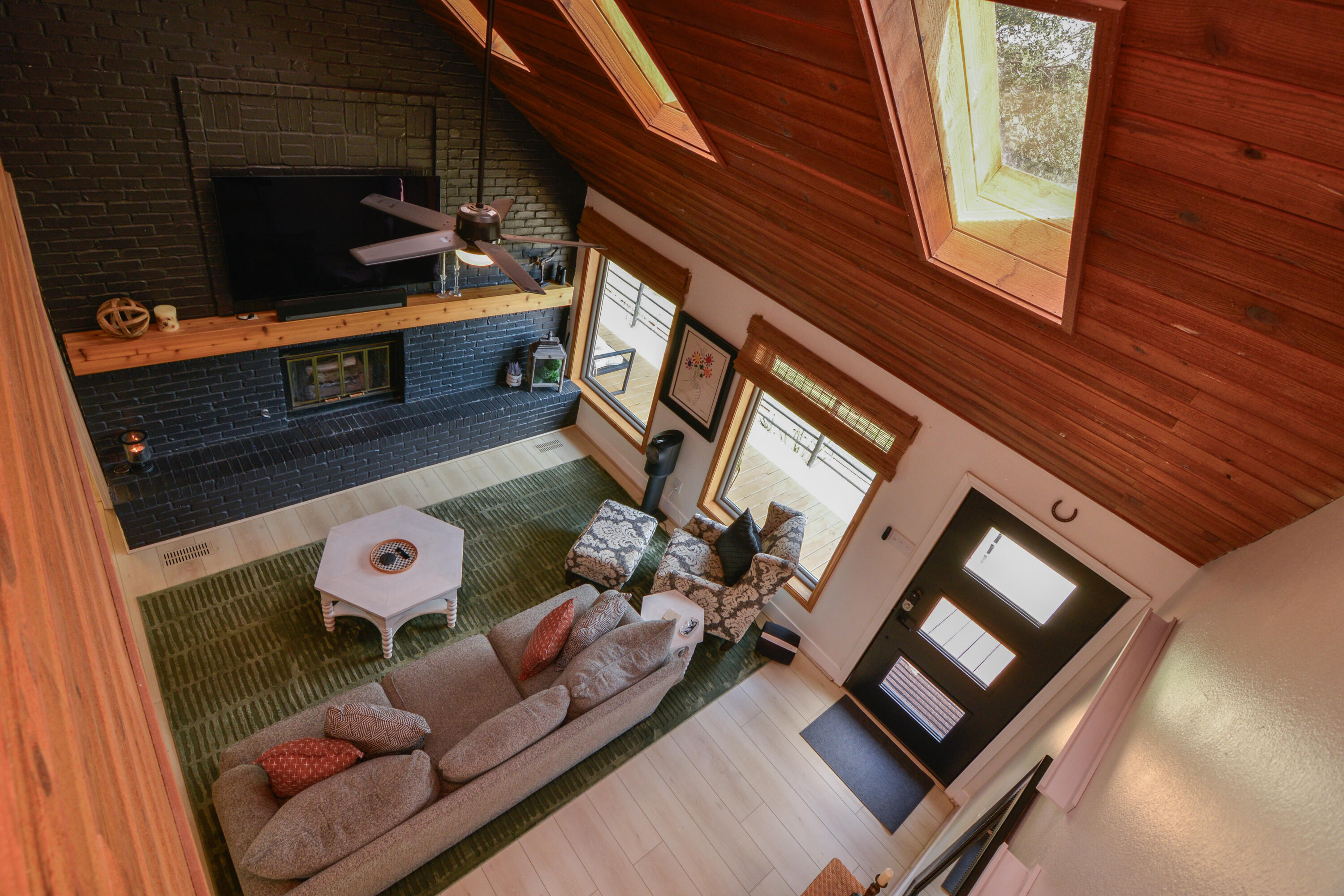 69 South Lake Shore Drive Ransom Canyon, TX 79366 - Photo 41 of 49 a living room with furniture and a fireplace